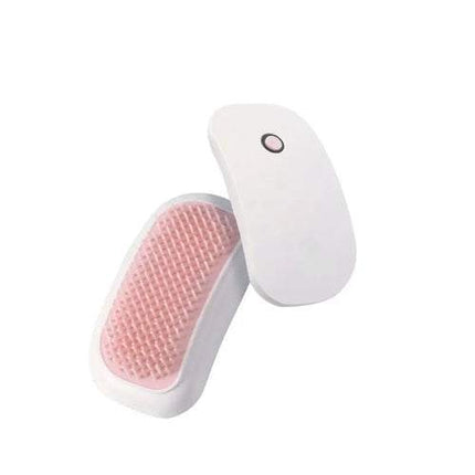 Pink hairbrushes with bristle heads