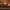 7 color flame light with flowing flames on a table, surrounded by a candle and book.