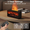 Tabletop fireplace with flame effect and remote control on a wooden surface.