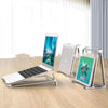 Portable aluminium laptop stand and riser base with 30-degree tilt and non-slip silicone pads for stable support.