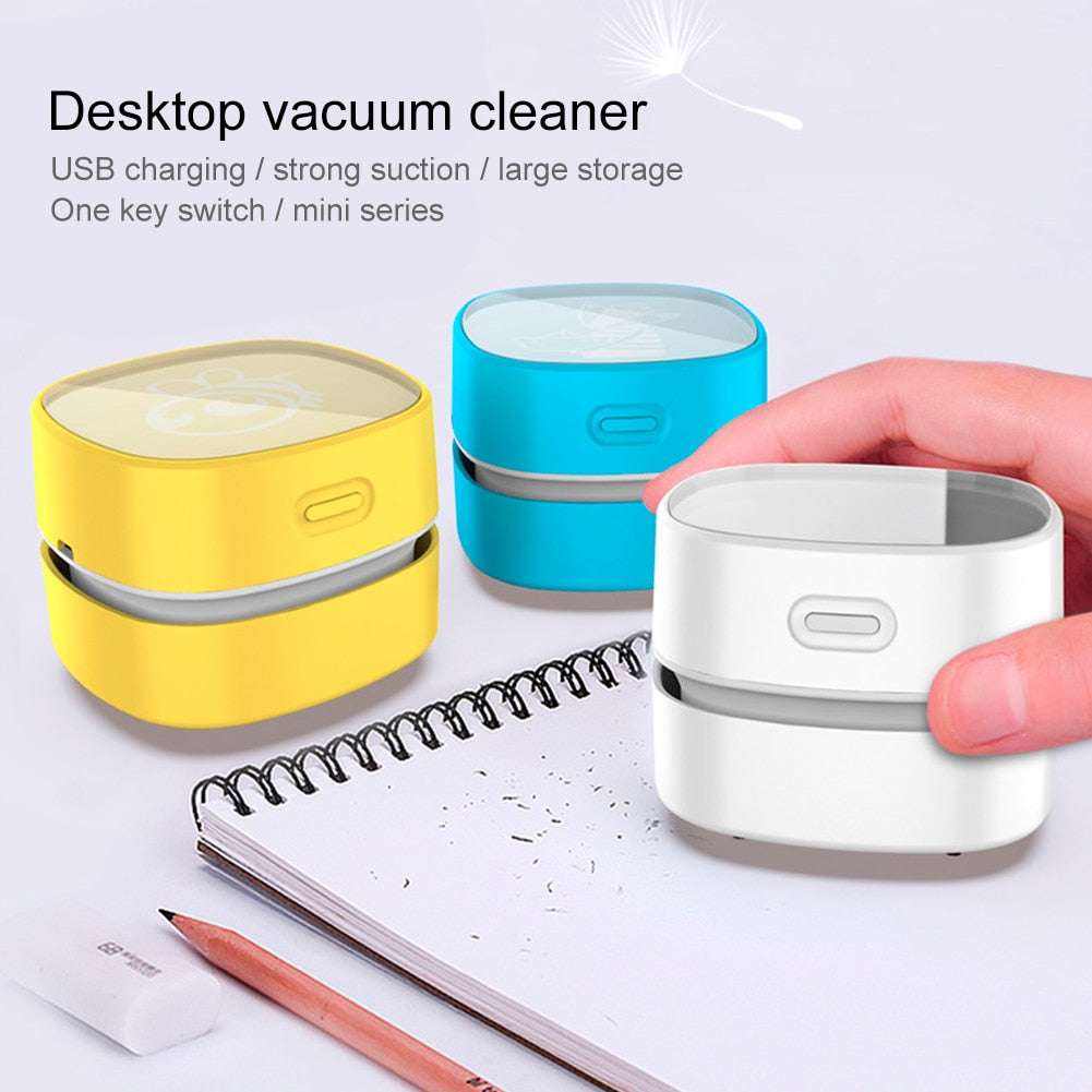 Compact portable handheld vacuum cleaner in yellow, blue, and white for desktop cleaning with USB charging and strong suction