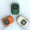 Three portable mini USB fans in green, orange, and white with compact design and lanyards for hands-free use.